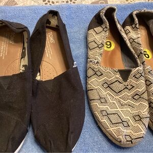 TOMS Black and Patterned Slip-On Shoes